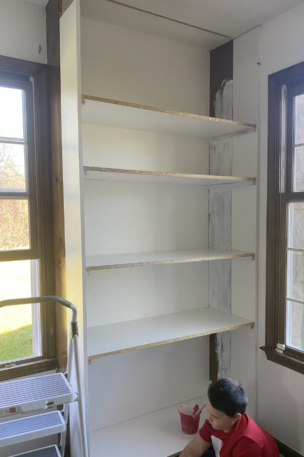 This DIY Built in Shelving is a great project for beginners who want a budget friendly way to add custom built in storage for their space. #built ins #diy built ins #built in shelving #diy wood projects #diy home projects