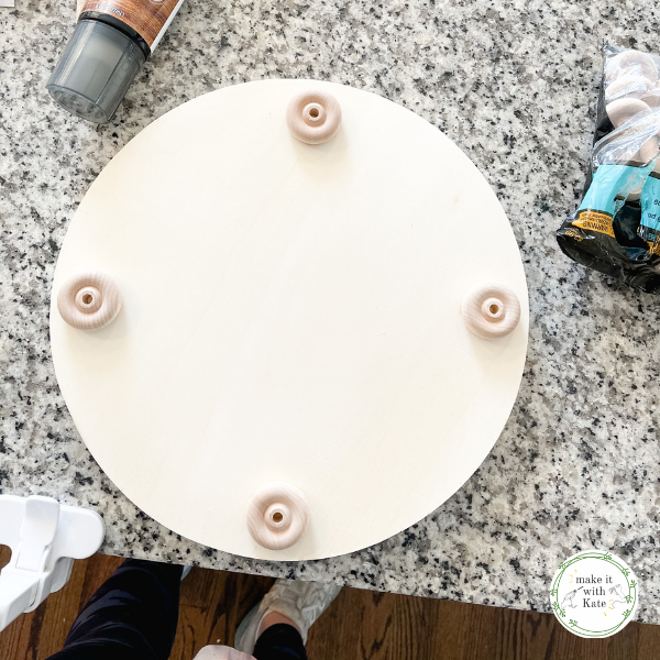 This DIY farmhouse tray uses an unfinished wooden round, stain and hardware to create a beautiful single tray for all of your home decor. #diyhomedecor #diyfarmhouse #woodtraydecor