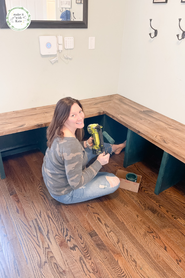 This DIY mudroom bench is a corner bench with open cubby storage below. Use this basic design for any size or length bench. #mudroomdesign #diywoodworking #diybuildingprojects #homedesign #interiordesign #buildingplans