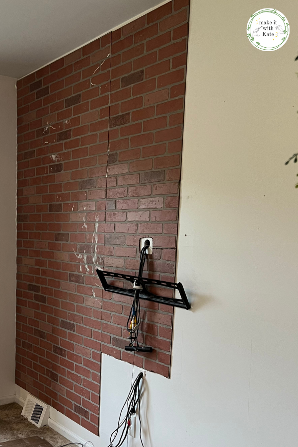 process photo of brick wall paneling installation